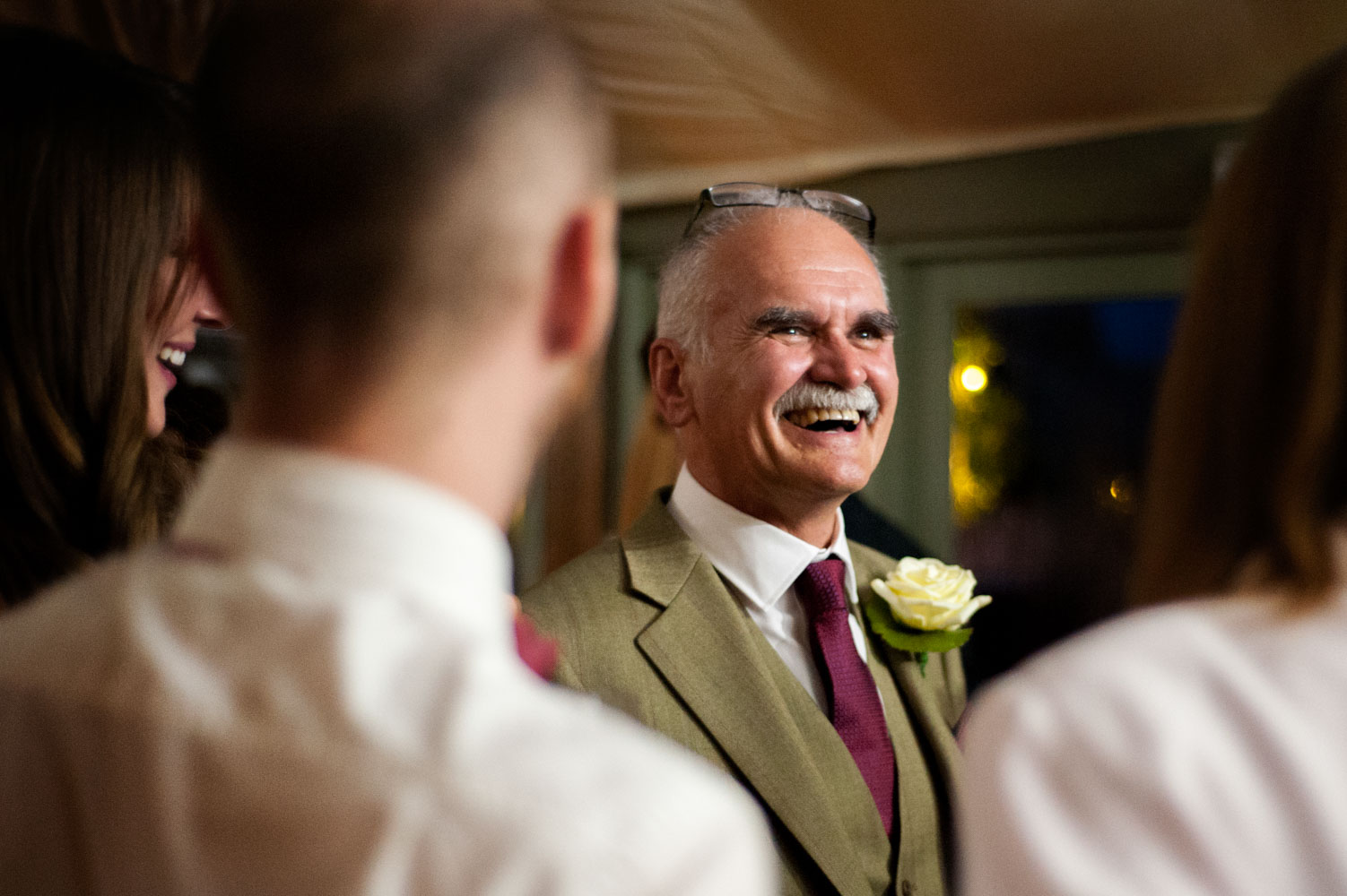 Father of the bride at Pangdean Old Barn wedding reception by Brighton documentary wedding photographer James Robertshaw