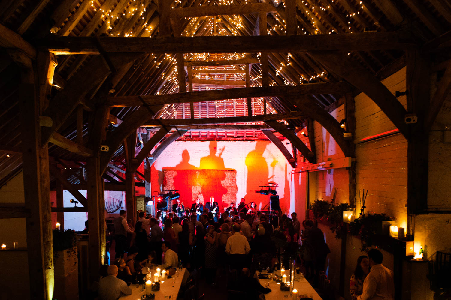 Live band at Pangdean Old Barn wedding reception by Brighton documentary wedding photographer James Robertshaw
