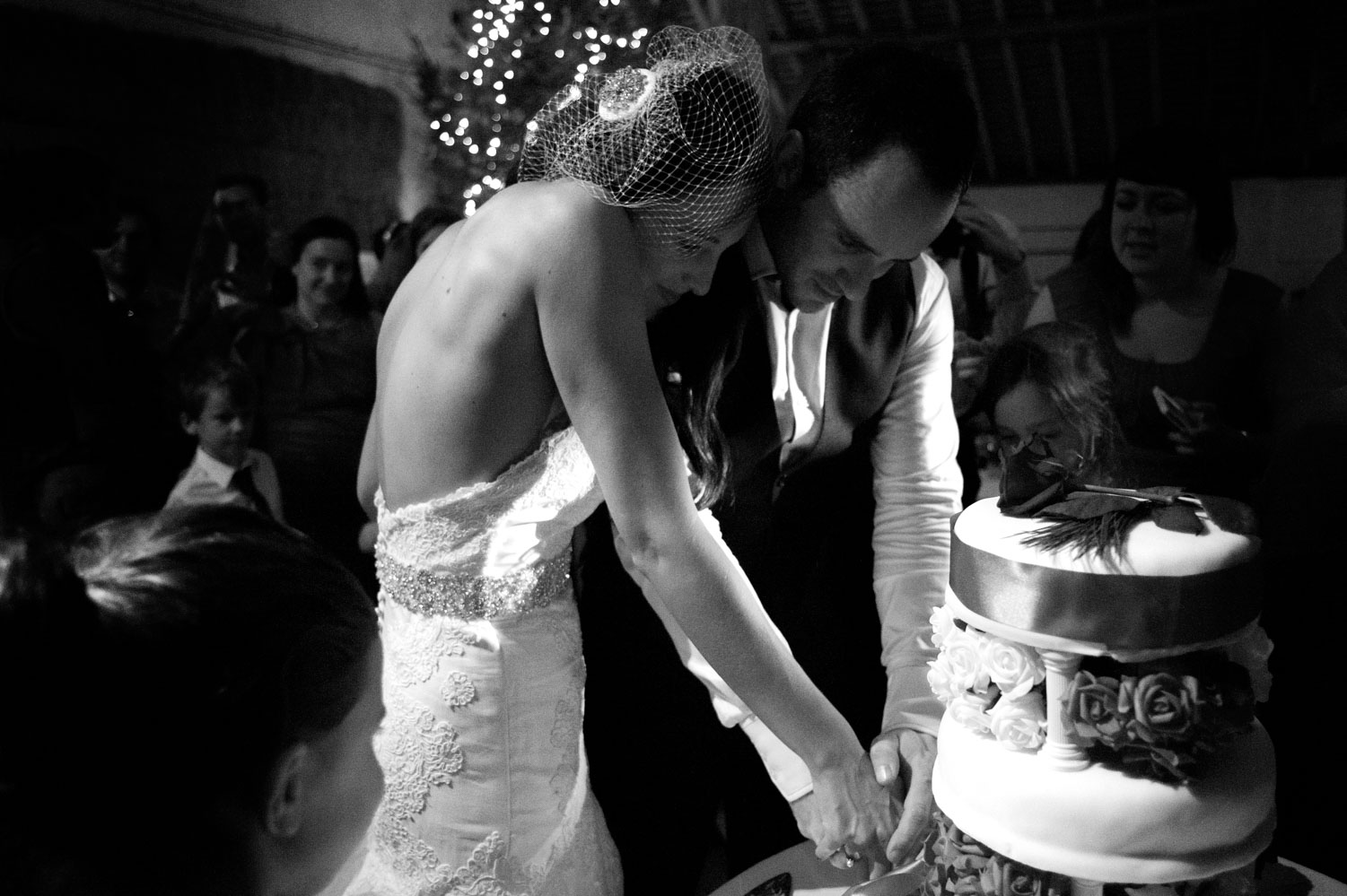 Bride and groom cutting the cake at Pangdean Old Barn