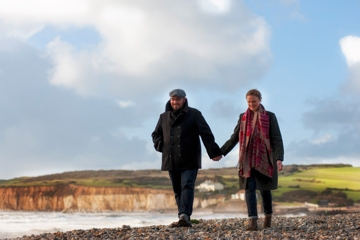 Couple walking in Seven Sisters country park