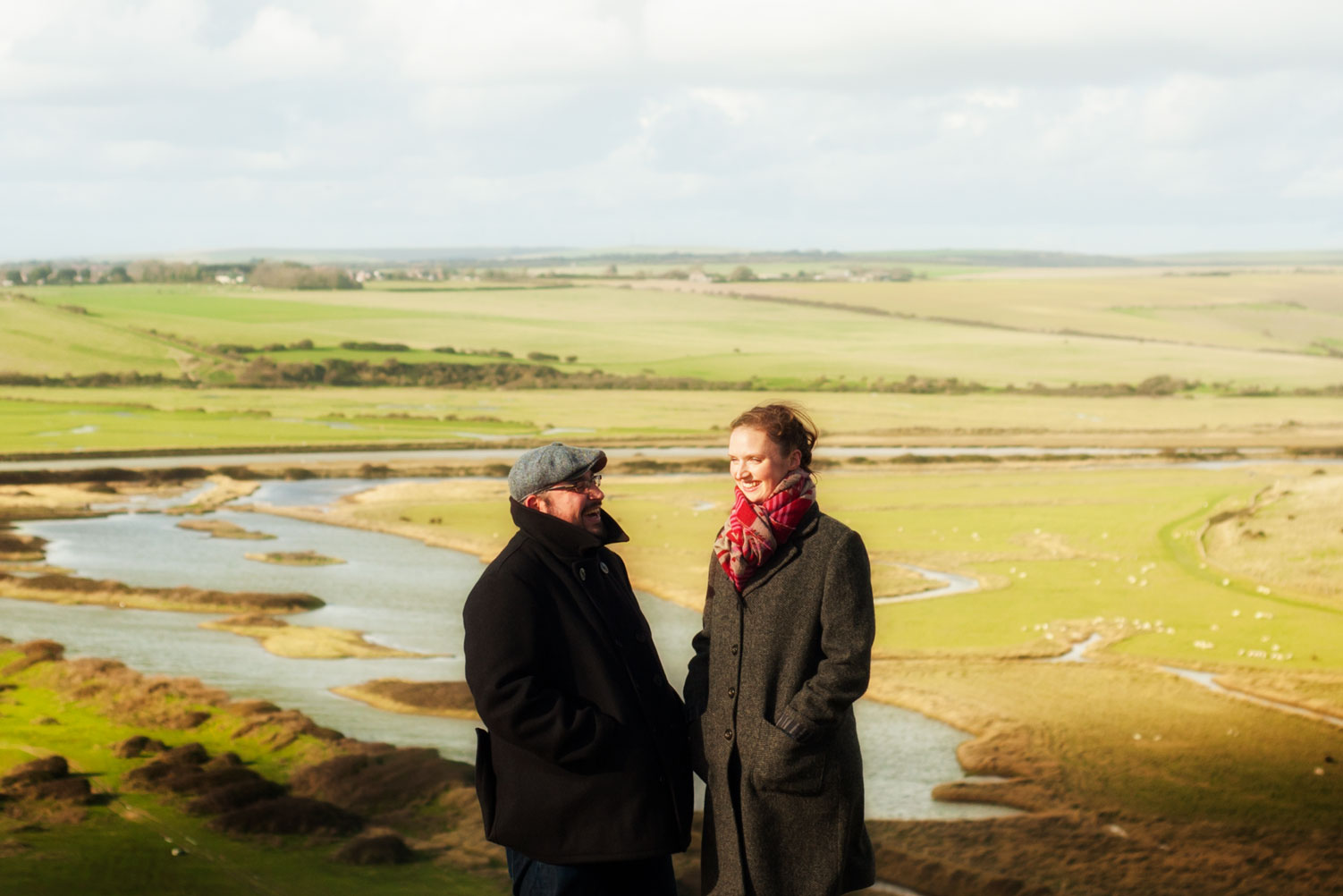 Couple walking in Seven Sisters country park