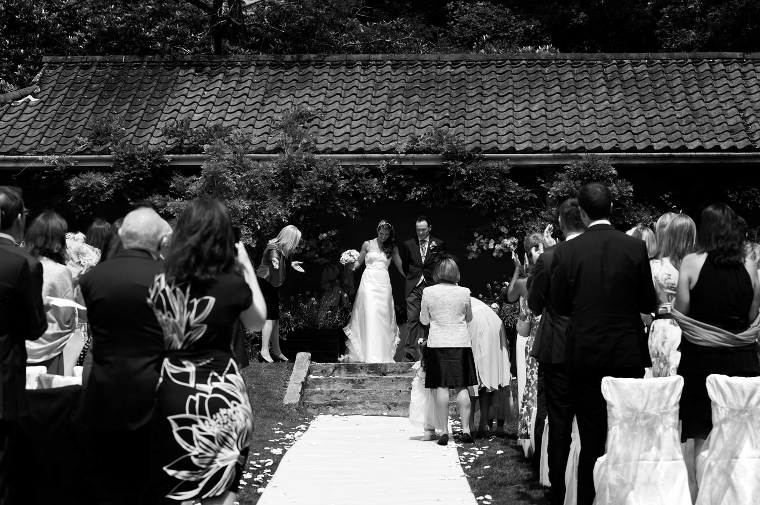 Couple just after wedding receptoin at Ashdown Park hotel