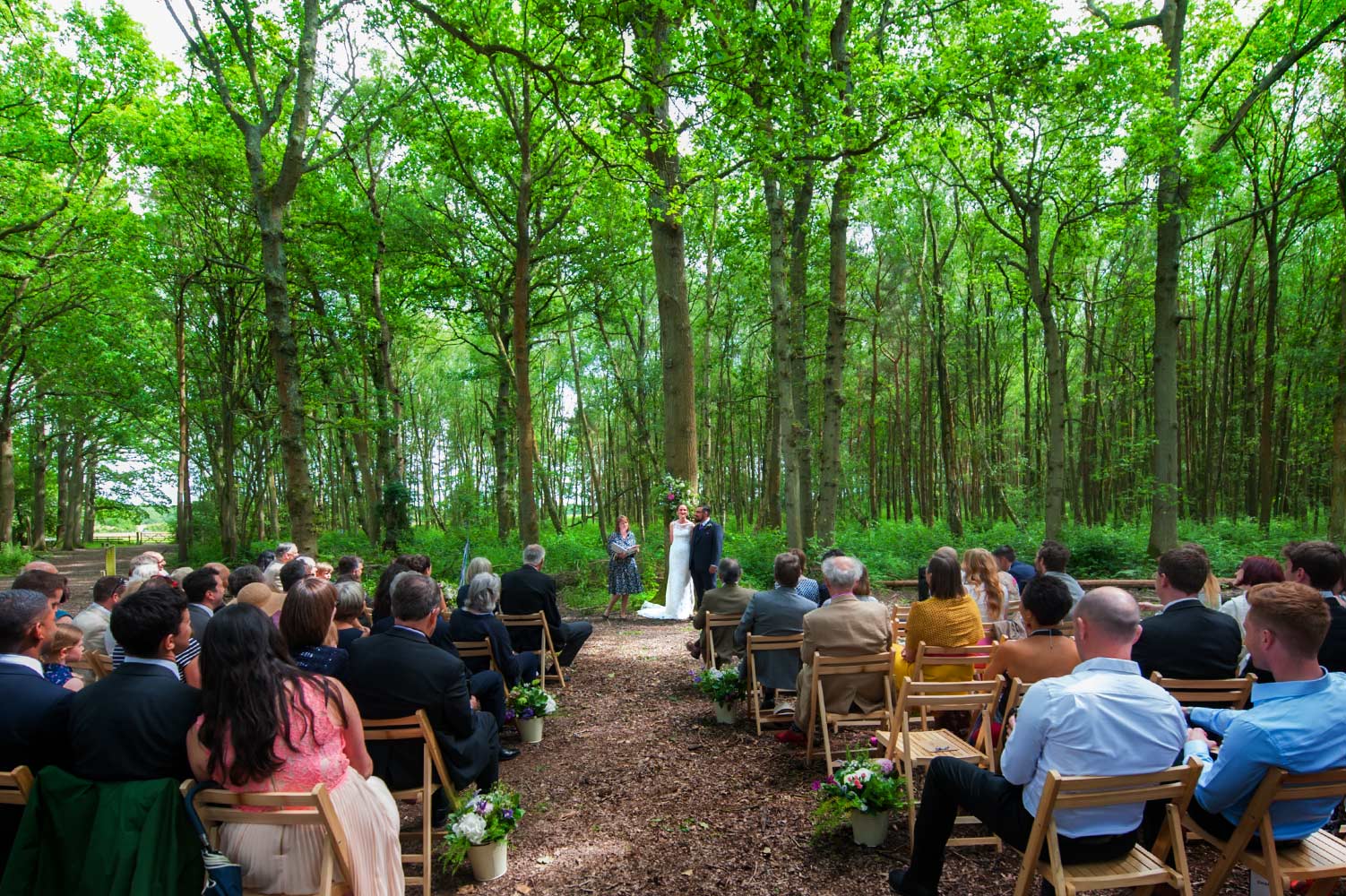 Woodland wedding ceremony by Sussex reportage photographer James Robertshaw