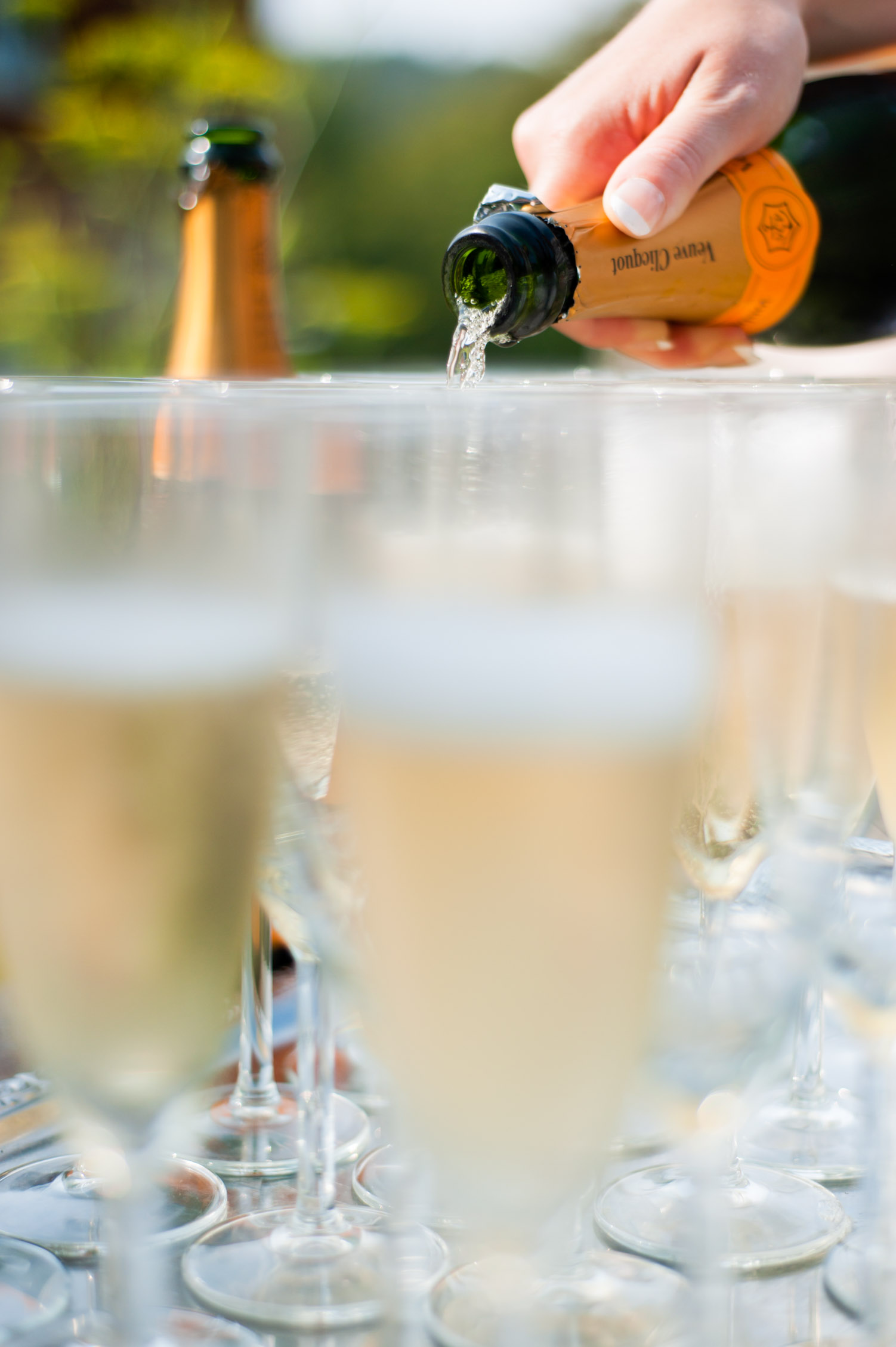 Champagne being poured at wedding reception