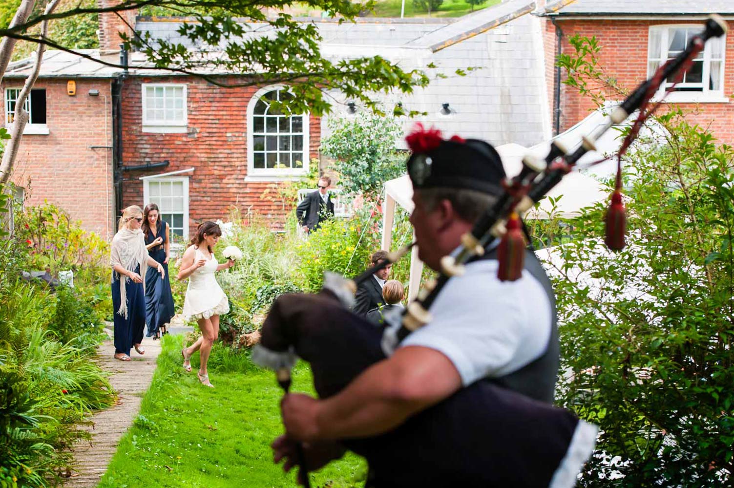 Bride walking in the garden of the Old Rectory