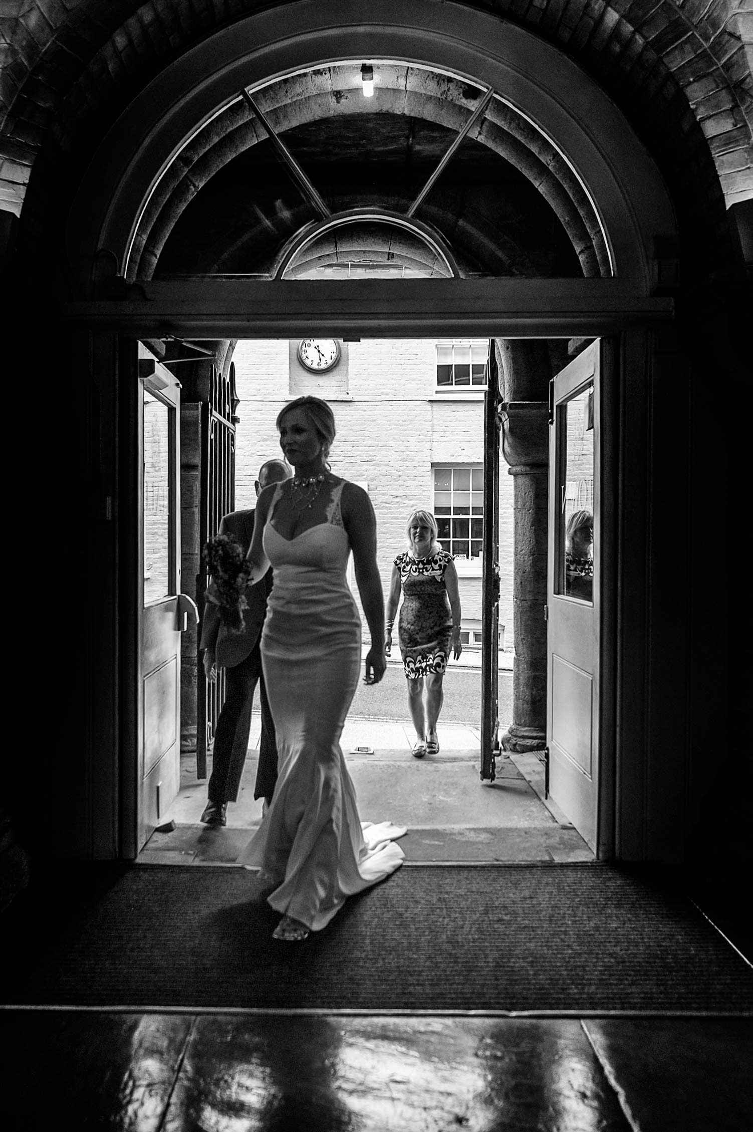 Bride arriving at Arundel Town Hall by Sussex documentary wedding photographer James Robertshaw