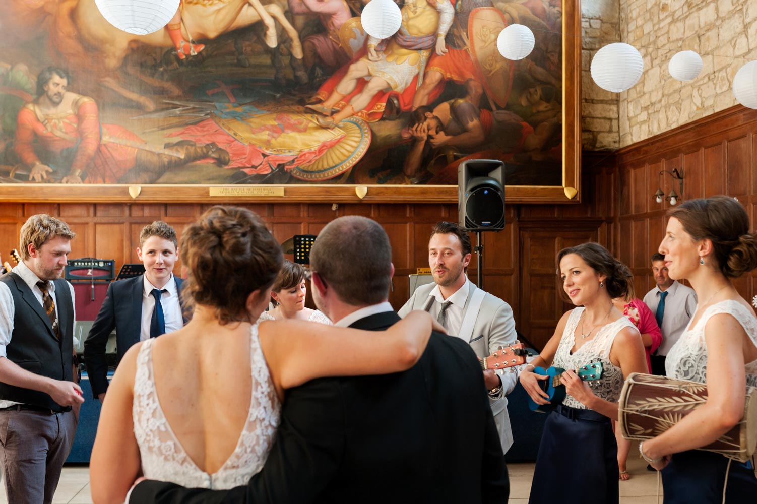 Bride grrom and guests at Battle Abbey School wedding reception