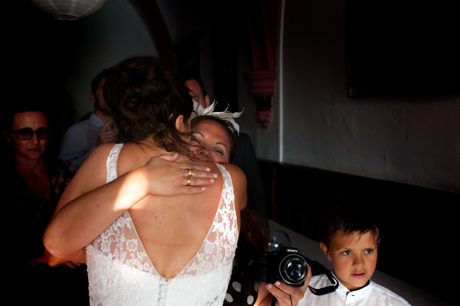 Bride embracing guest at Battle Abbey