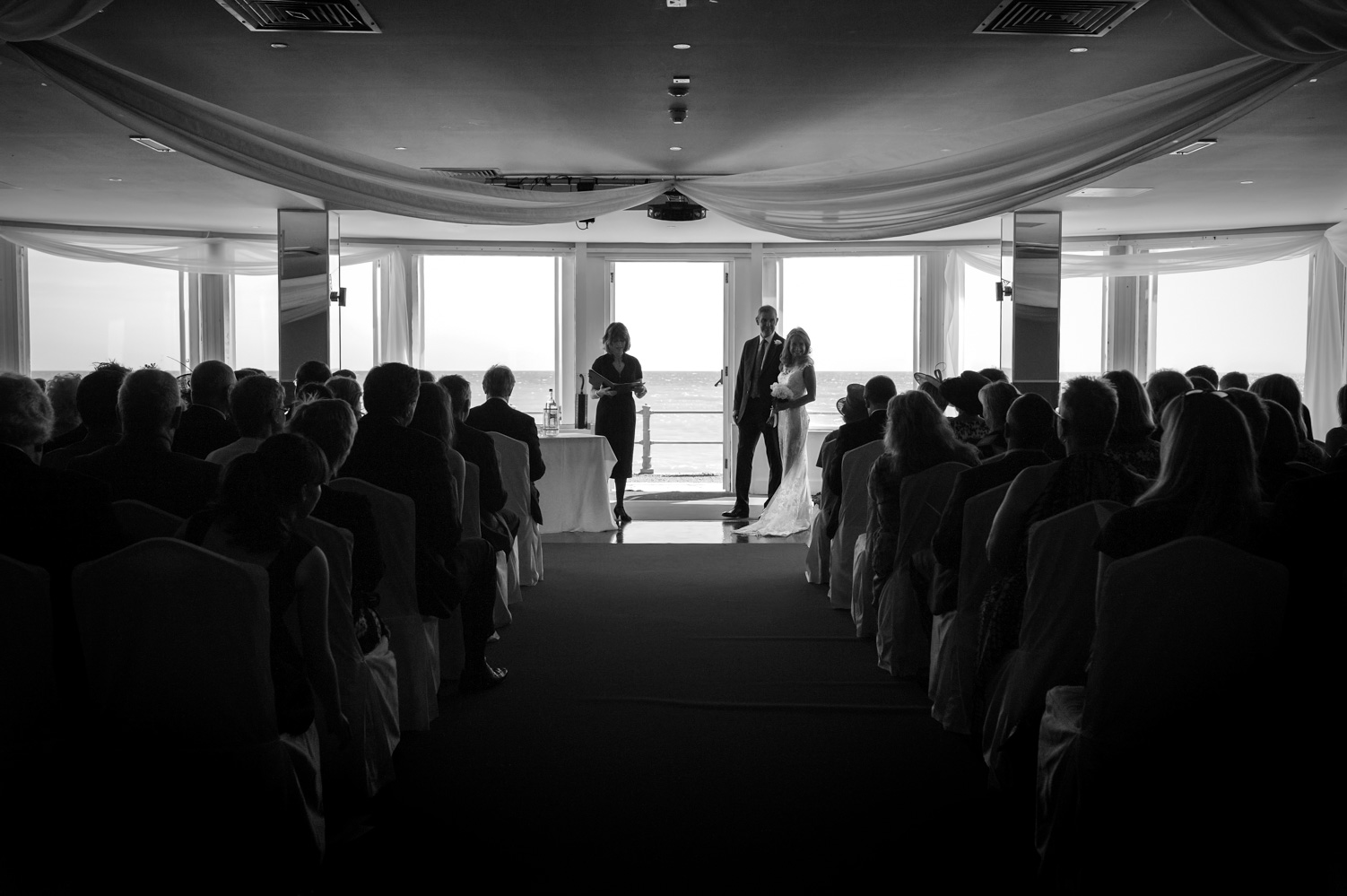 Wedding ceremony at the Azur Hastings by informal Sussex wedding photographer James Robertshaw