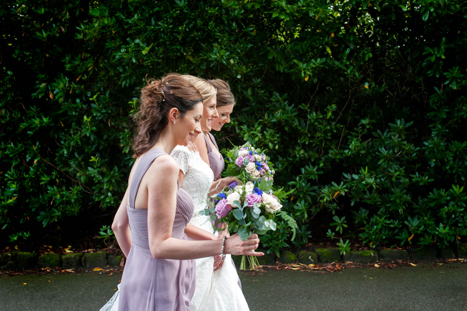 Bride and bridesmaids walking