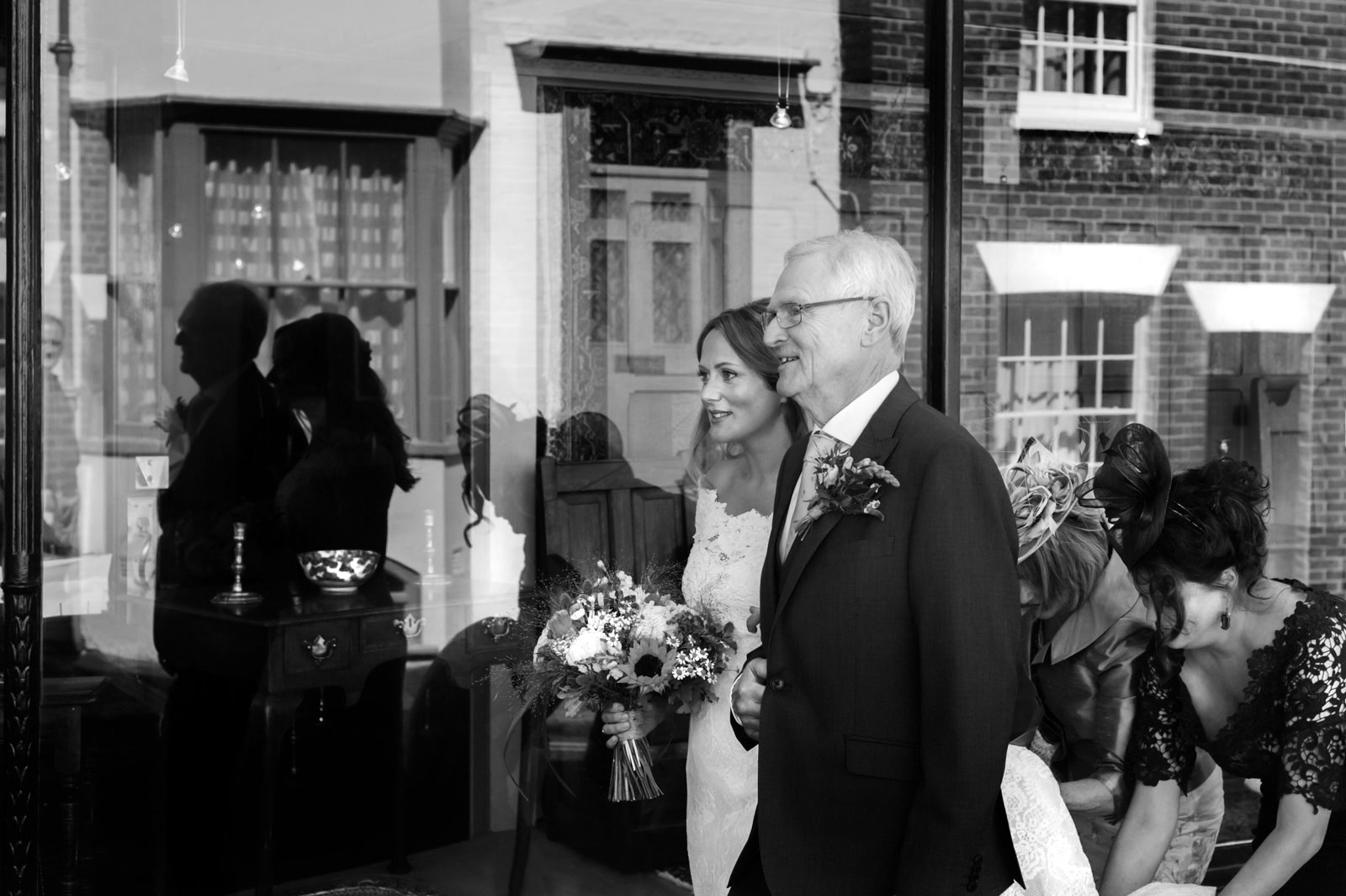 Bride walking with father to Rye Town Hall wedding