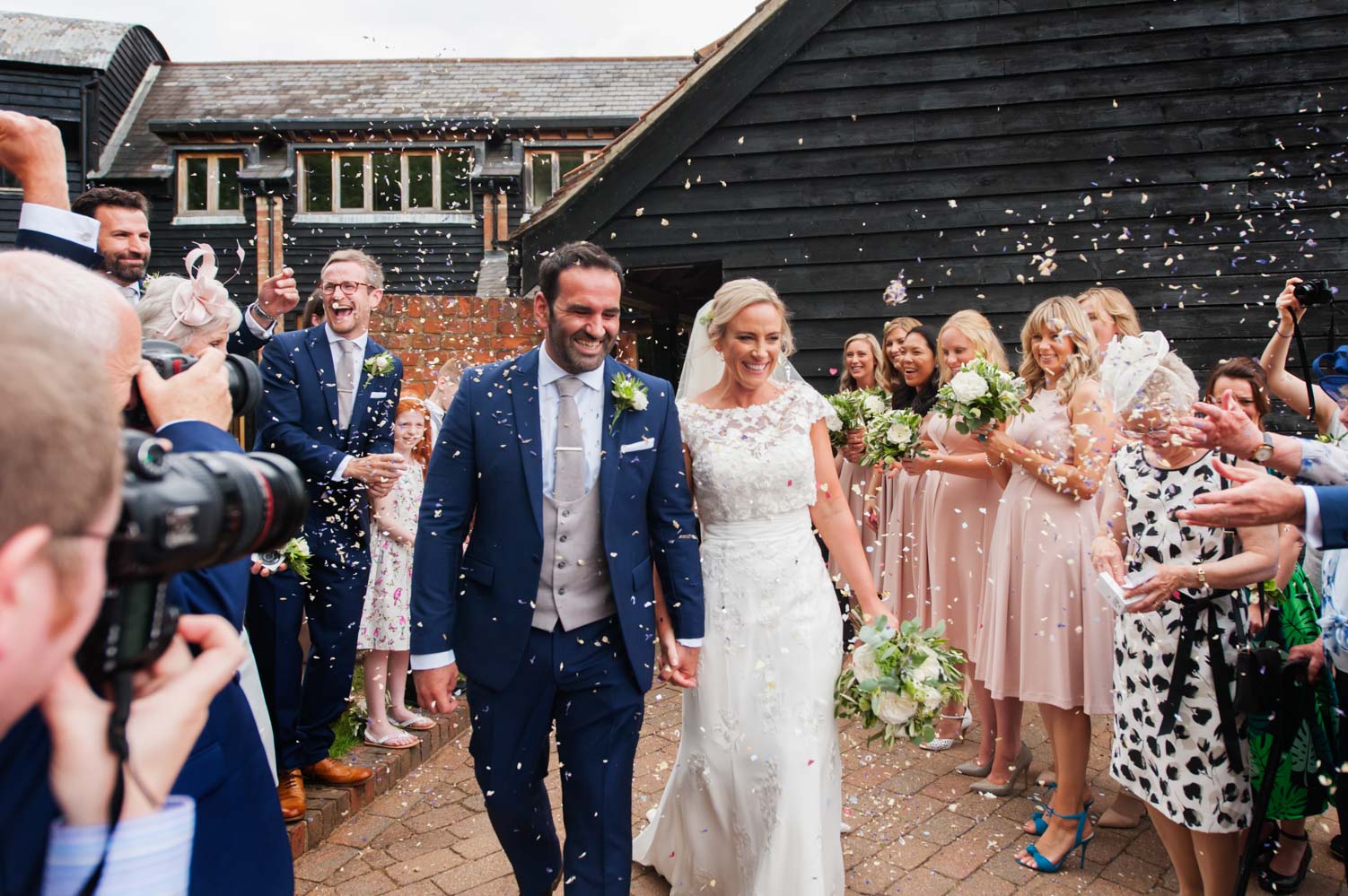 Confetti at Tewin Bury Farm wedding by Sussex wedding photographer James Robertshaw.