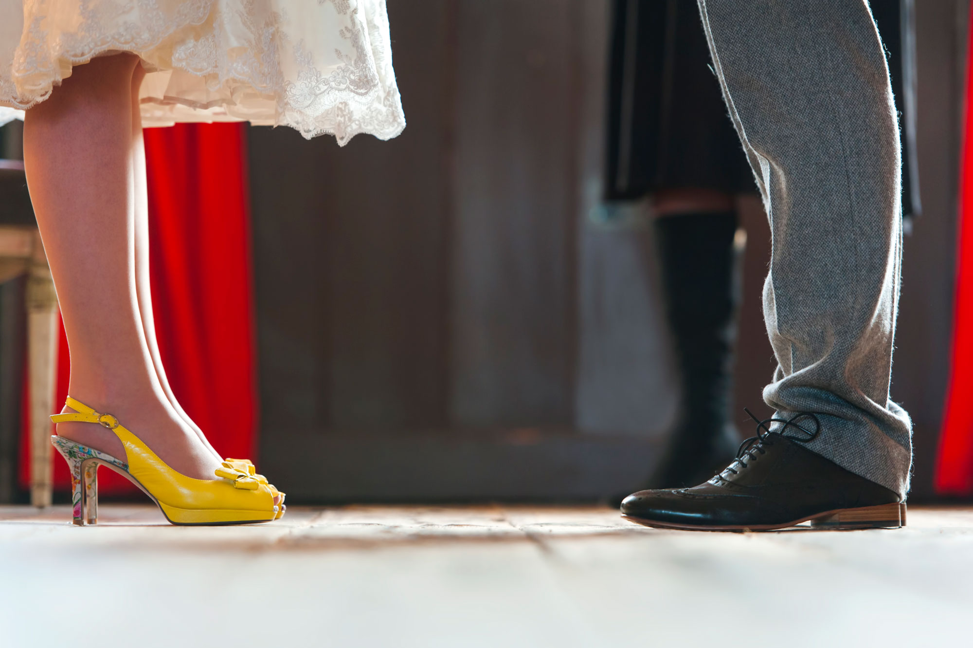 Bride and groom's feet during wedding ceremony 