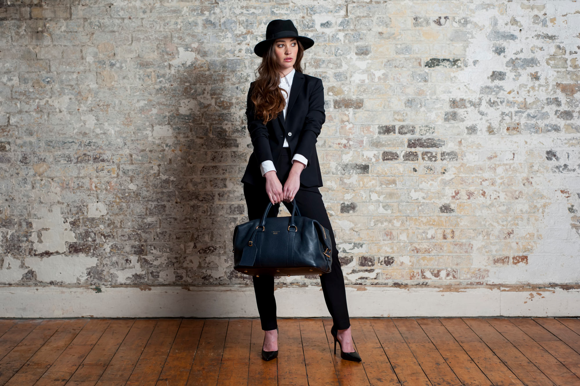 Model with bag by Loxley England