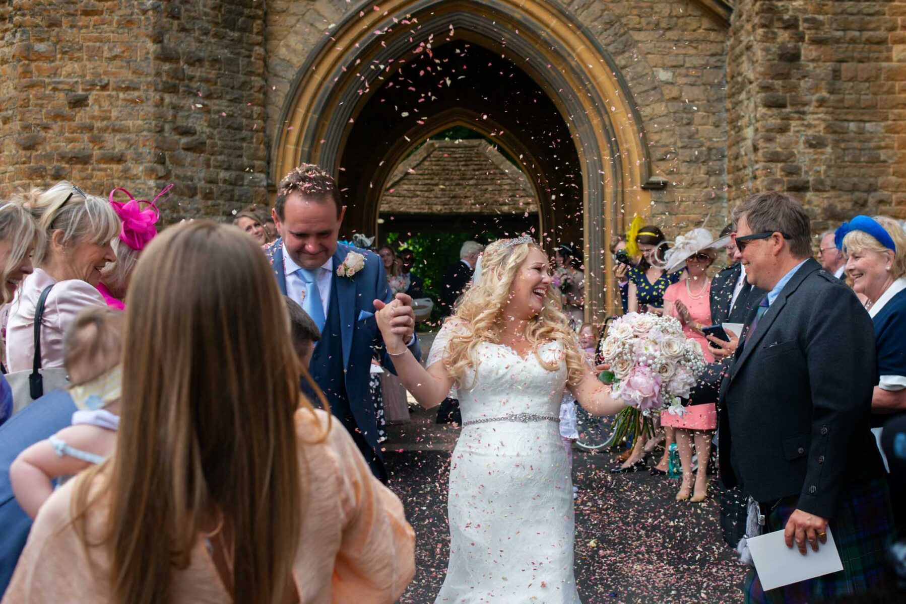 Bride groom and confetti