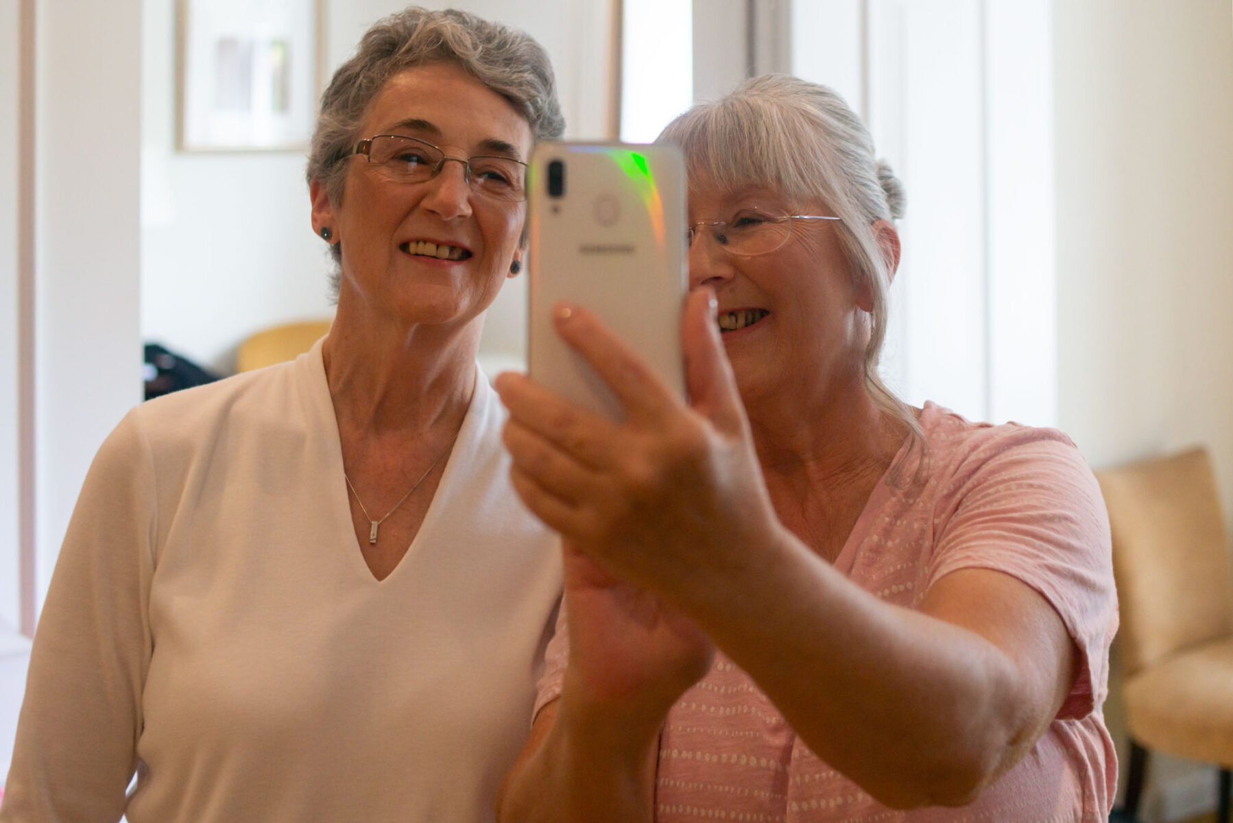 Bride's mother taking selfie 