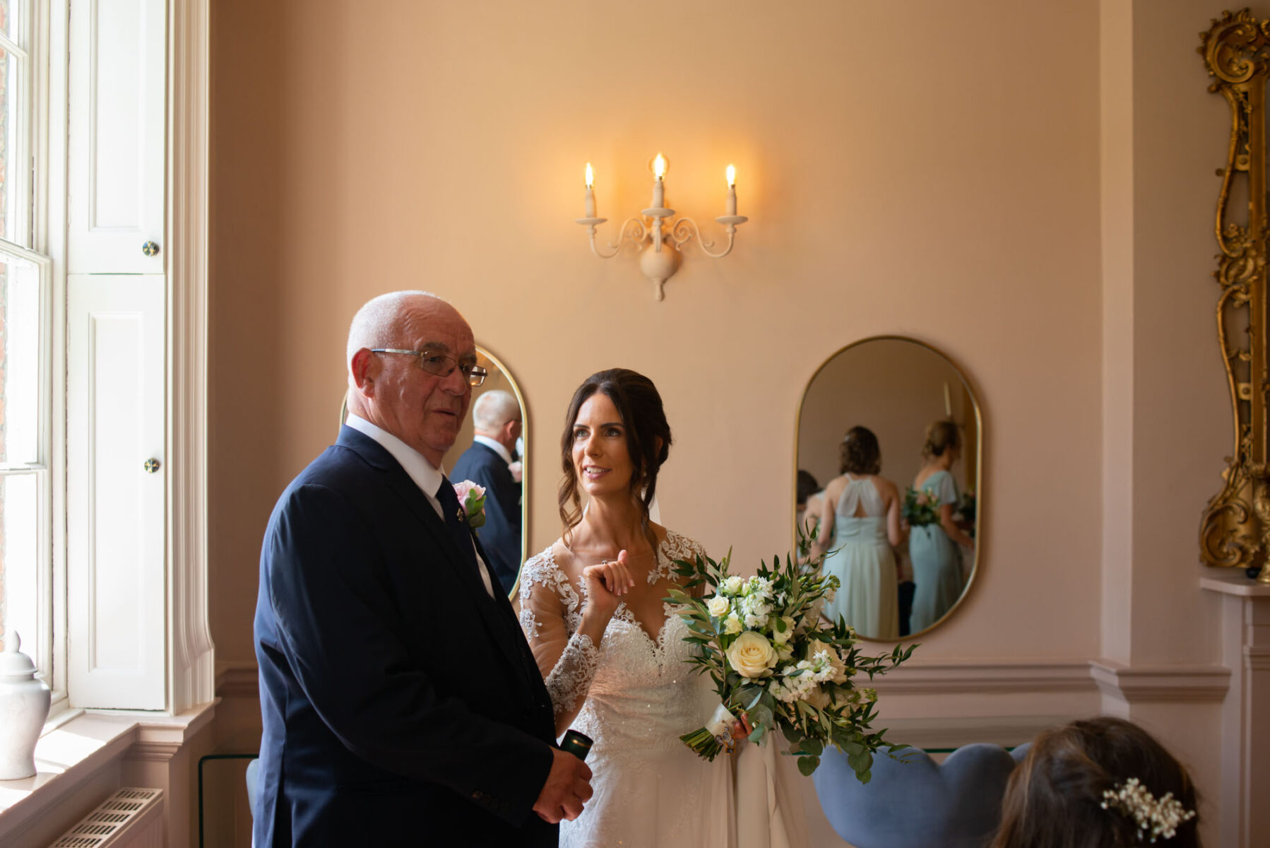 Bride looking at father by Orangery Maidstone wedding photographer James Robertshaw