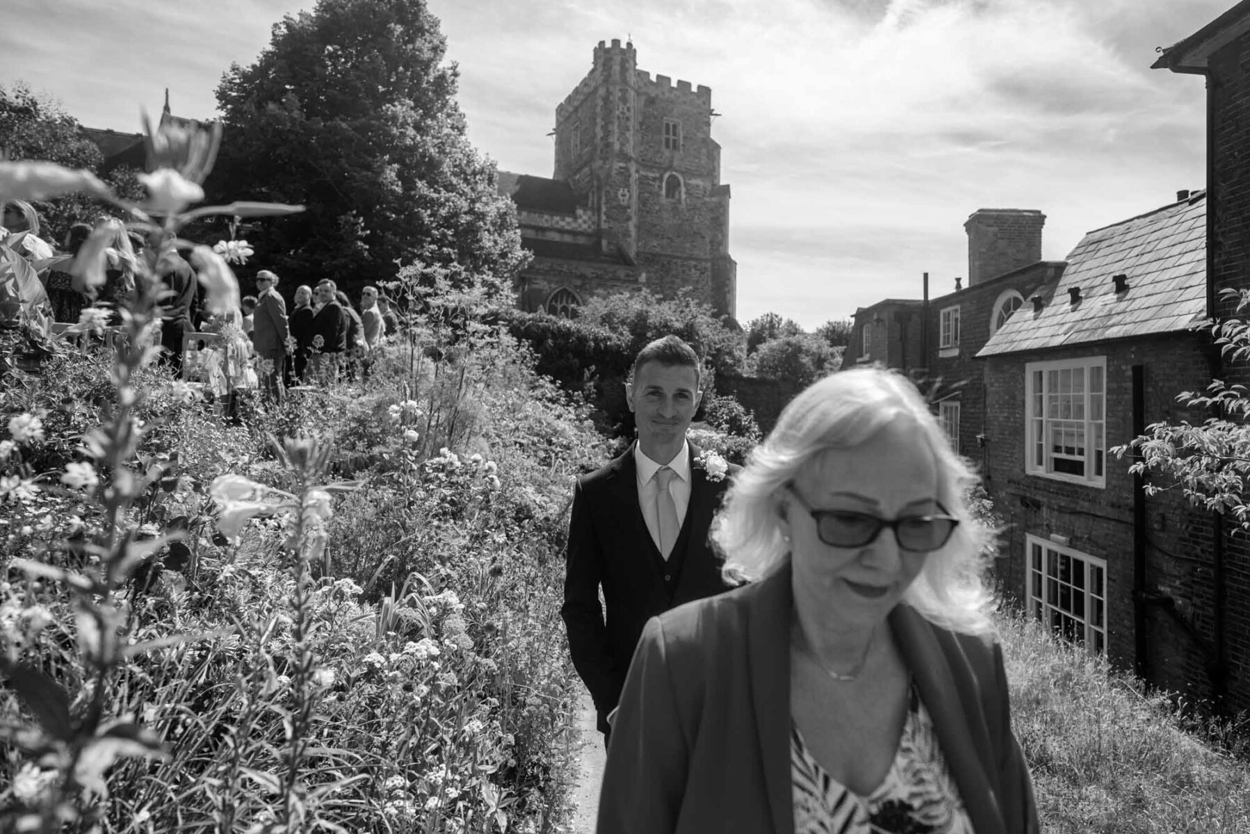 Groom walking through garden at the Old Rectory Hastings