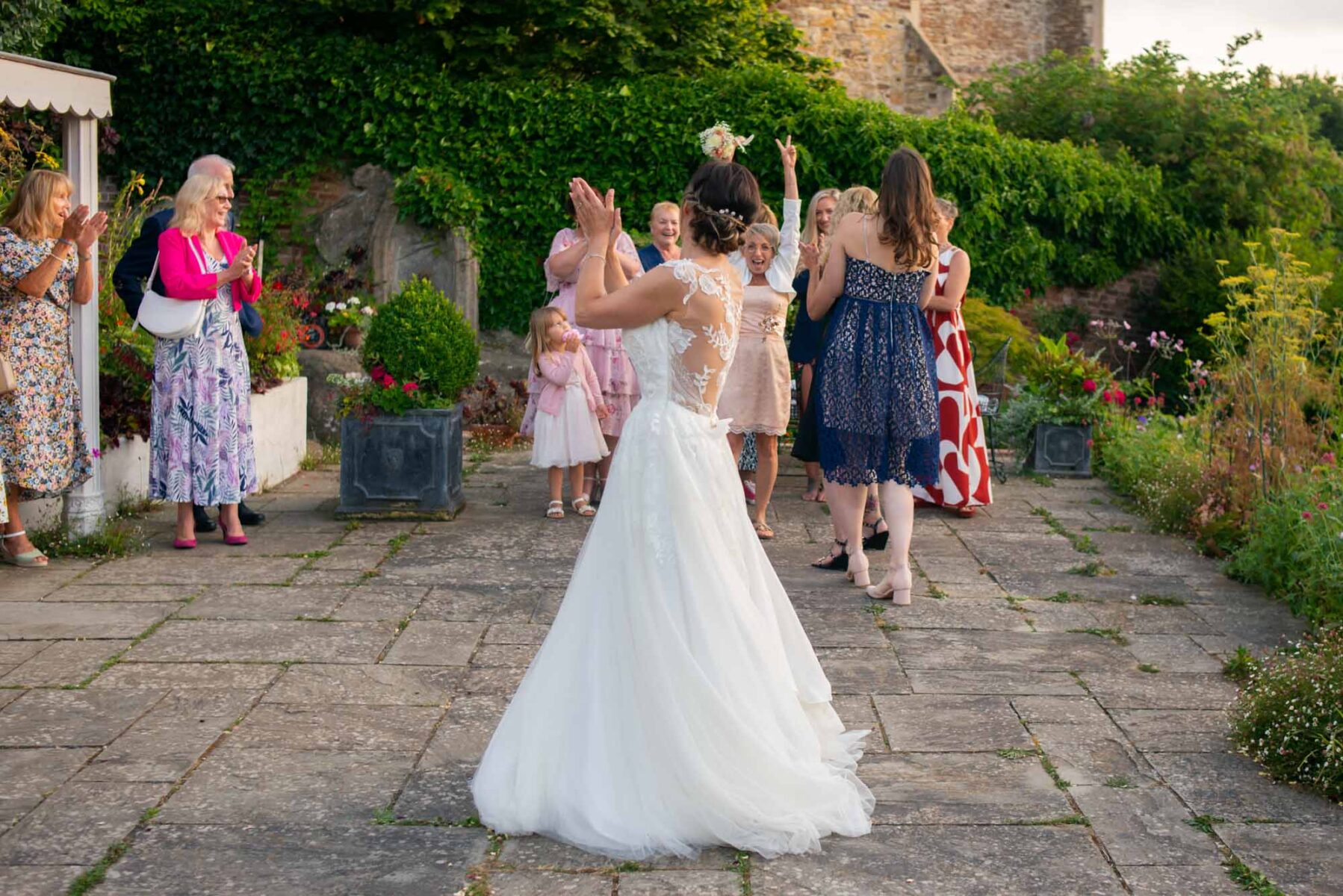 Bridesmaid catching bouquet at the  Old Rectory Hastings 